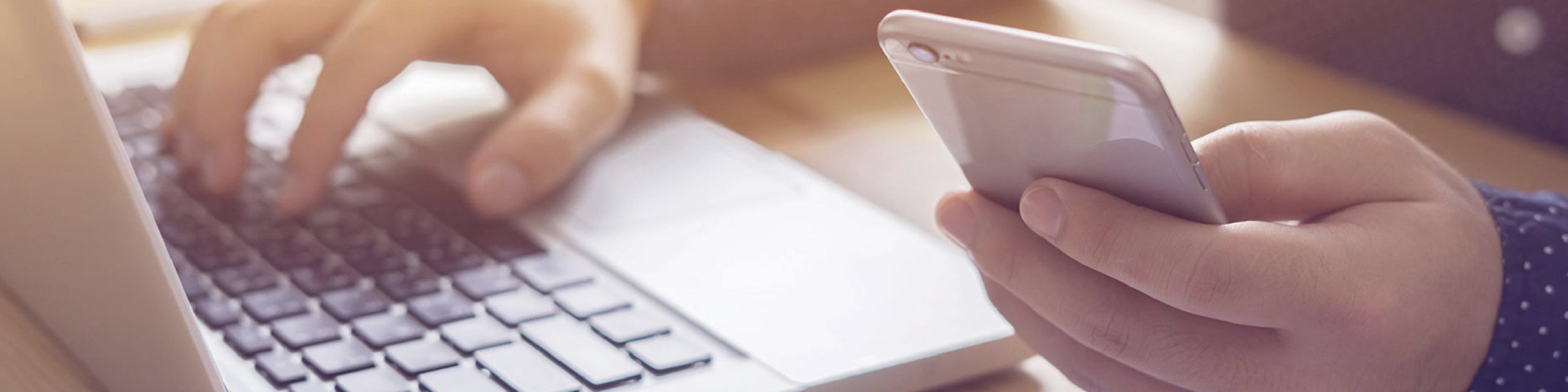 Person typing on a laptop